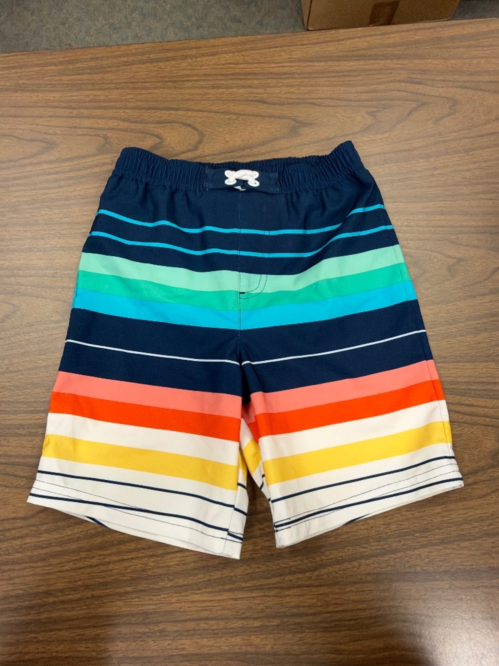 Boys 5T swim trunks.  Brant wonder nation